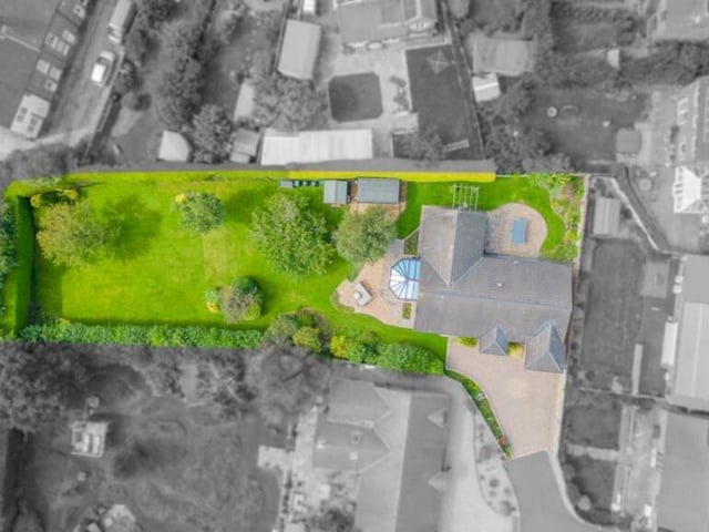 This last drone shot shows two outbuildings within the garden. There is a shed for storage and also a wooden workshop or studio that has light and power and would be perfect as a garden office or for some DIY tinkering.