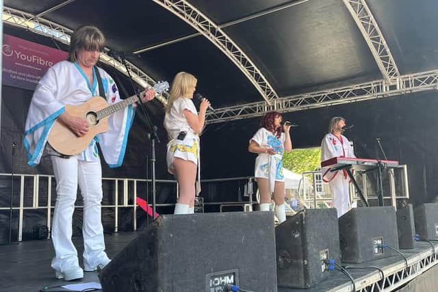ABBA tribute band performing at Party in the Market.