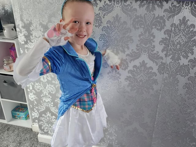 Poppy aged six from Blidworth. White rabbit from Alice in Wonderland.