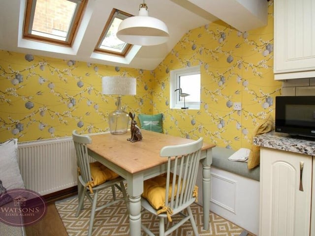 This corner of the dining kitchen has space for a cute breakfast table, with two Velux windows above.