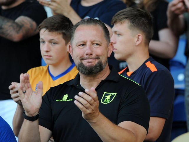 Mansfield Town fans watch the 2-1 win over Sheffield Wednesday on 24 July 2018.