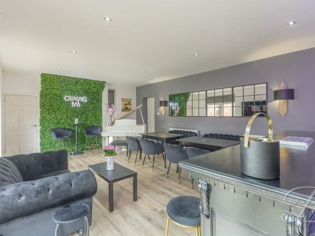 One last look at the bar, which has space for extensive seating. There is also a laminate floor, downlights and a built-in speaker.