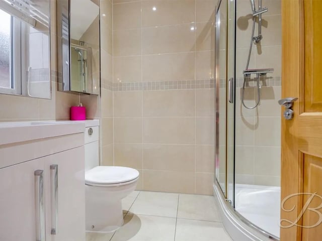 The shower room features a three piece suite with low flush WC, shower and hand wash basin. This room also benefits from underfloor heating.