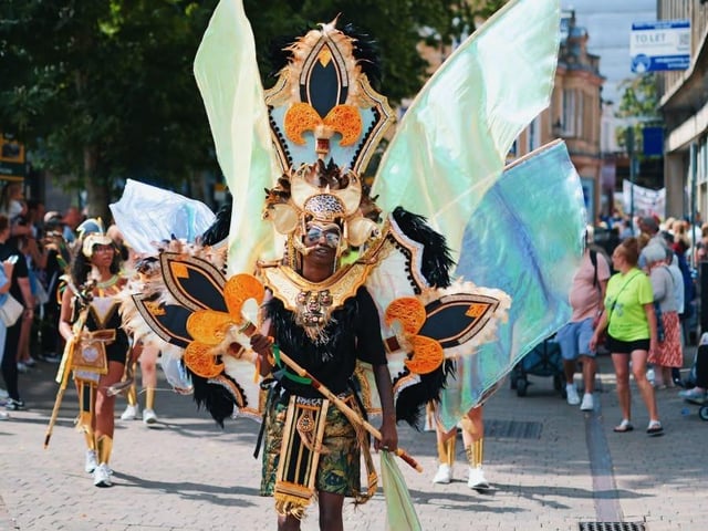 The parade was led by dance troupes, gymnasts and musicians