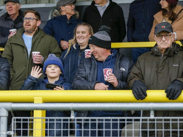 Mansfield fans at The EnviroVent Stadium for the match against Harrogate Town.