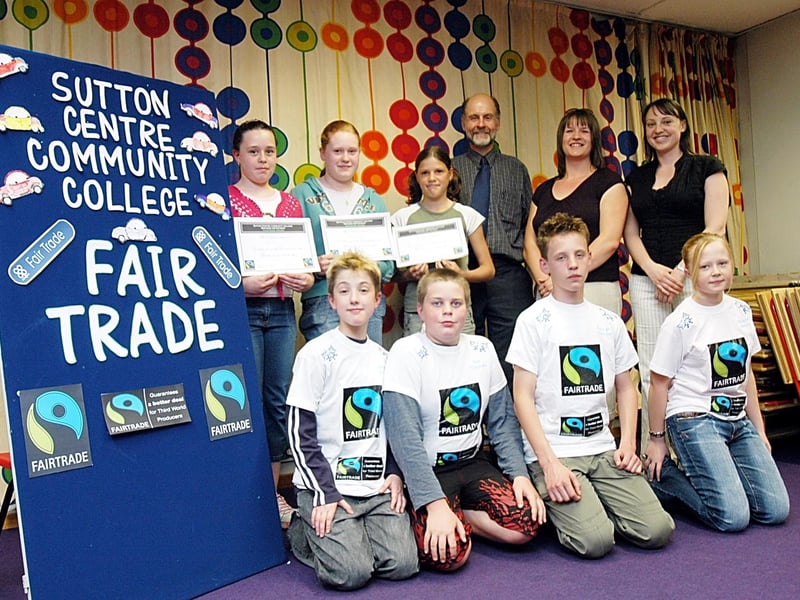 Pupils at Sutton Centre in 2006 proudly showcase their Fair Trade work at Lincoln University. They are joined by head teacher Roger Tanner and business tutors Kathryn Green and Lindsey Trayler.