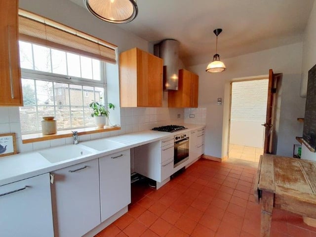 Not far from the breakfast kitchen is this handy utility room. Bigger than most utility rooms, we think you'll find.