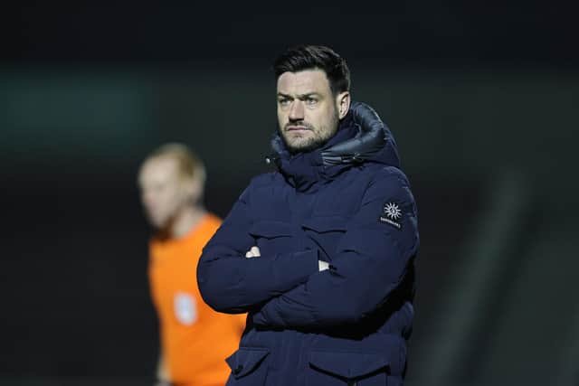 AFC Wimbledon manager Johnnie Jackson looks on. (Photo by Pete Norton/Getty Images)