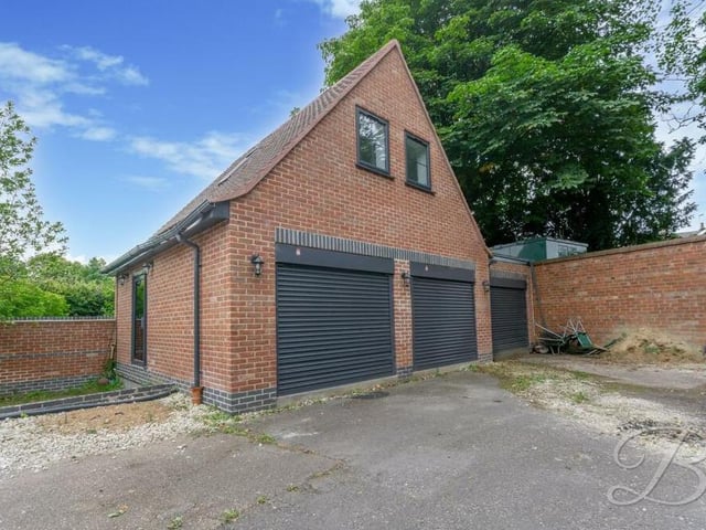 As we step outside, here is the two-storey, detached garage, which can be put to multiple uses. At present, it boasts a gym and even a shower room.