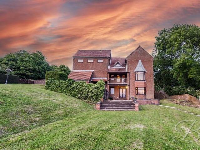 A magnificent home with stables and paddock. Nestled in the peaceful and sought-after area of Blidworth, this unique four-bedroom detached residence is a rare opportunity to own a truly special family home set within approximately three acres of private grounds. Blidworth is a charming Nottinghamshire village surrounded by rolling countryside, offering a tranquil rural lifestyle while remaining well-connected to nearby towns. Lovingly self-built in 1993 and thoughtfully designed across three levels, the home offers exceptional flexibility and generous living spaces-ideal for growing families or those seeking a countryside escape with scope to personalise.