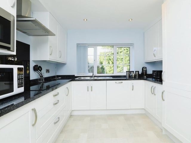 We start our tour of the house in the sparkling kitchen, which is whiter than white! It is fitted with a comprehensive range of wall and base units, along with work surfaces and a stainless steel sink and drainer. Integrated appliances include an electric hob, double oven and extractor fan, fridge freezer and dishwasher. There is also spotlighting to the ceiling.