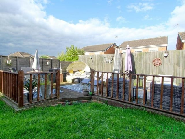 A highlight of the back garden is this impressive raised decking area with plenty of space for seating. It's the ideal spot for entertaining family and friends in the summer.