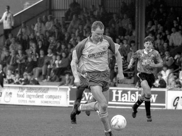 Second goal scorer Phil Stant on the attack as the tension mounts.