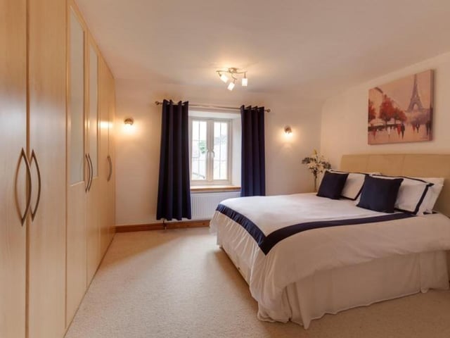 The fourth and final bedroom might be the smallest, but is still a decent size and still attractive. Again, the amount of storage space is colossal.