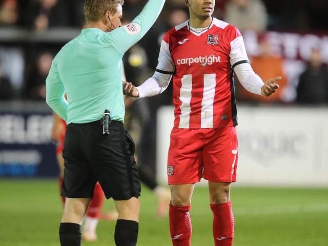 Jake Caprice of Exeter City is shown a yellow card. Exeter collected 50 bookings and three reds.