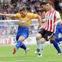 Alex McDonald in action the last time Mansfield Town hosted Sheffield United in a pre-season friendly before fans back in 2018.