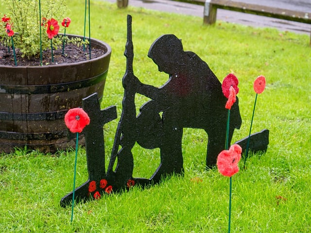 A soldier paying his respects.