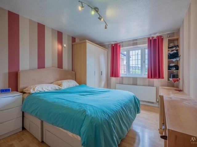 Another attractive bedroom at the Green Farm Road bungalow, complete with plenty of storage space.