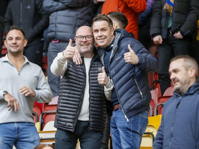 Travelling Stags fans watch the Sky Bet League 2 match against Bradford City.