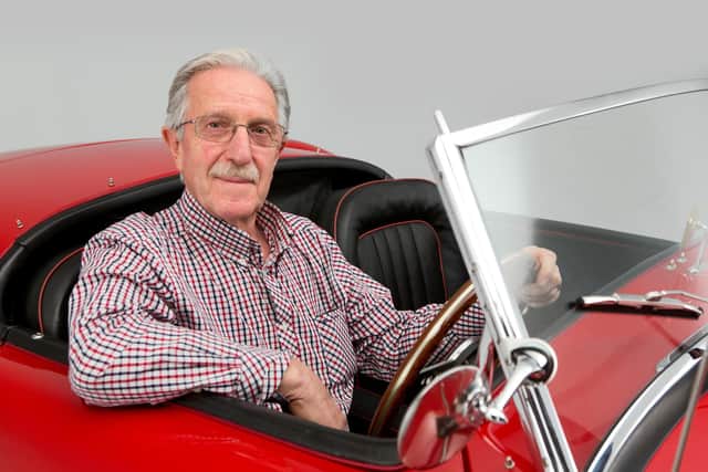 Pete Draycott, chief organiser of the Little John club show, at the wheel of one of three classic cars he owns.