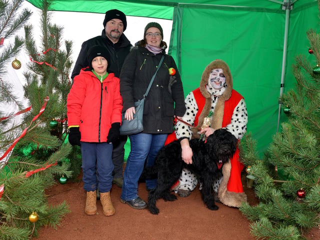Santa Paws Dog Grotto at Sherwood Forest in aid of Jerry Green Dog Rescue, pictured are the Bloxham family with Darcey.