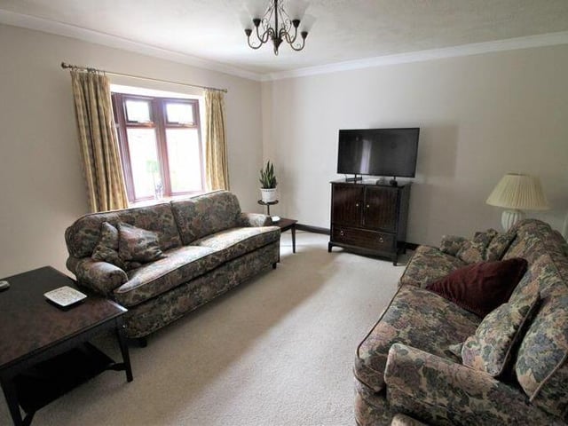 The lounge at the £425,000 cottage is the ideal spot for a relaxing night in, watching the telly.