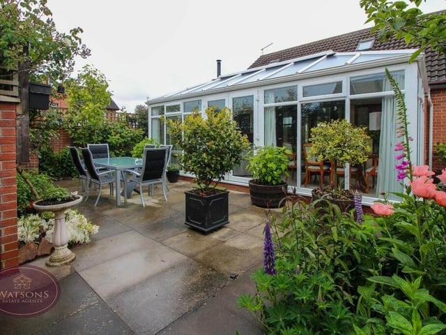 The garden at the rear of the house is an ideal place to relax with a cup of coffee or a glass of wine.