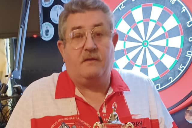 Garry Bennett with his title trophy.
