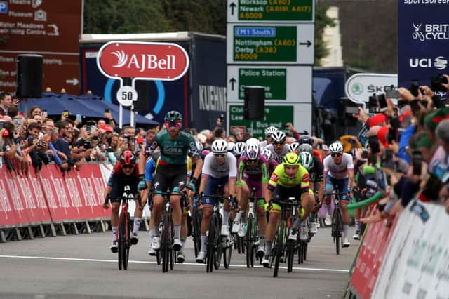 Tour of Britain riders cross the finish line. Photo: Paul Horton.