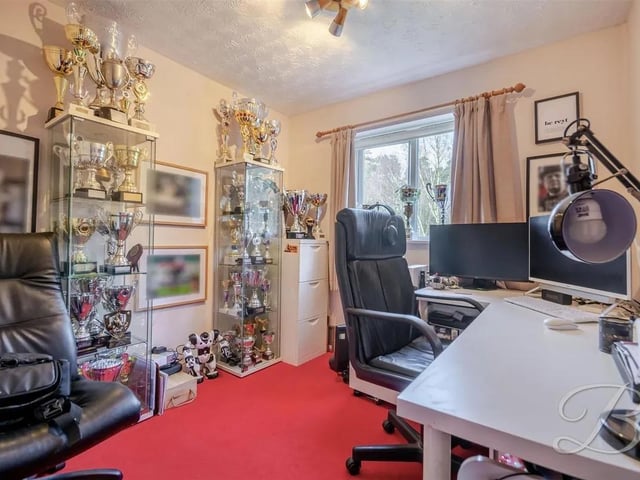 Versatile room perfect to be used as a study/office/guest bedroom with carpeted flooring and two windows to the front elevation.