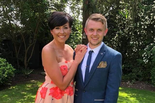 Katy Haydon (now blonde) pictured in her poppy dress previously at a wedding (when her hair was short and dyed brown) with her fiancé Lee Townsend  Picture: Katy Haydon/Facebook