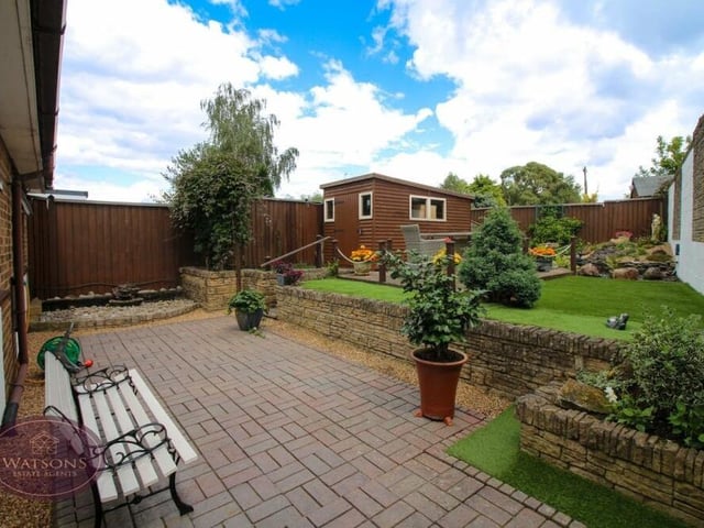 As we step outside the £375,000-plus Kimberley property, let's look around the beautiful garden. It includes a block-paved patio.