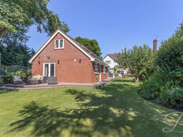 The annexe sits within the magnificent garden at the £575,000 property and has its own pleasant patio area with seating.