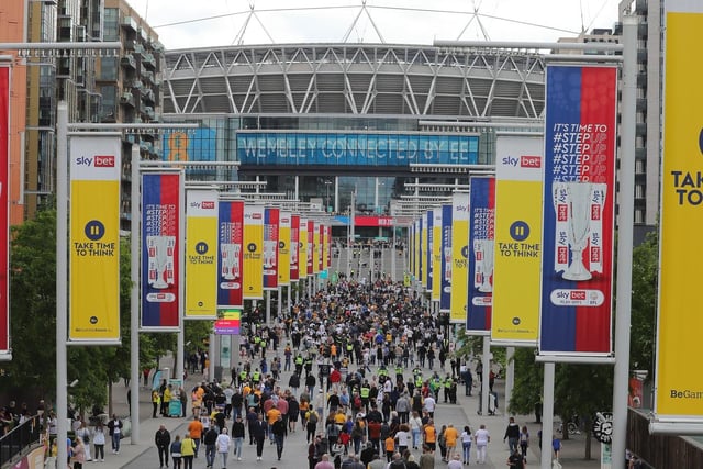 Mansfield Town fans soak up the Wembley atmosphere.