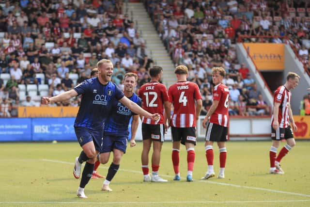 Mansfield Town defender Frazer Blake-Tracy (20) celebrates his first half goal during the Sky Bet League 1 match against Exeter City FC at St James Park, 16 Aug 2025   Photo credit : Chris & Jeanette Holloway / The Bigger Picture.media