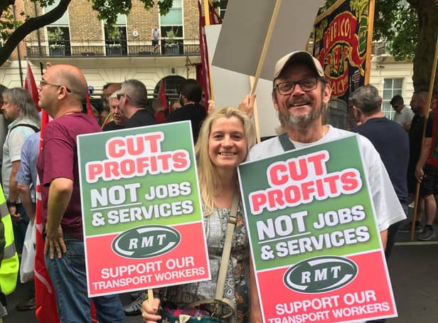 Andy Harkins, joined by wife, Helen, at the TUC demonstration in London.