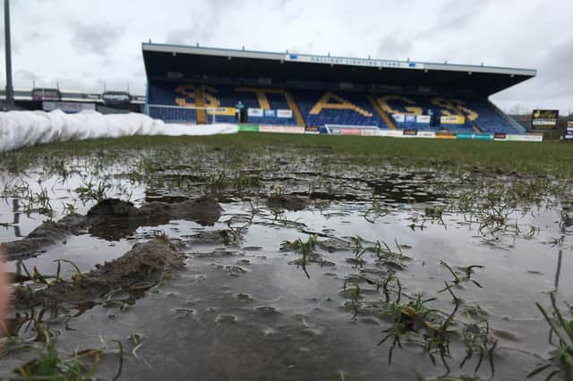The Mansfield Town pitch has been left unplayable by the heavy rain.