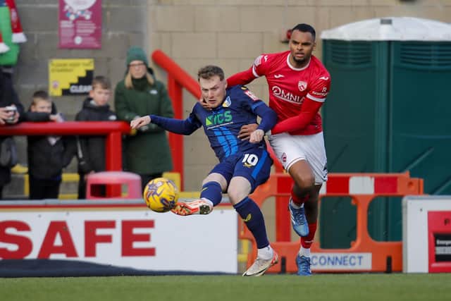 George Maris under pressure during the Sky Bet League 2 match against Morecambe FC at the Mazuma Stadium, 13 Jan 2024. 
Photo Chris & Jeanette Holloway / The Bigger Picture.media