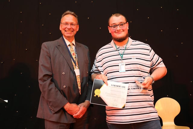 Andrew Cropley presented Branan Brown with his principal's award