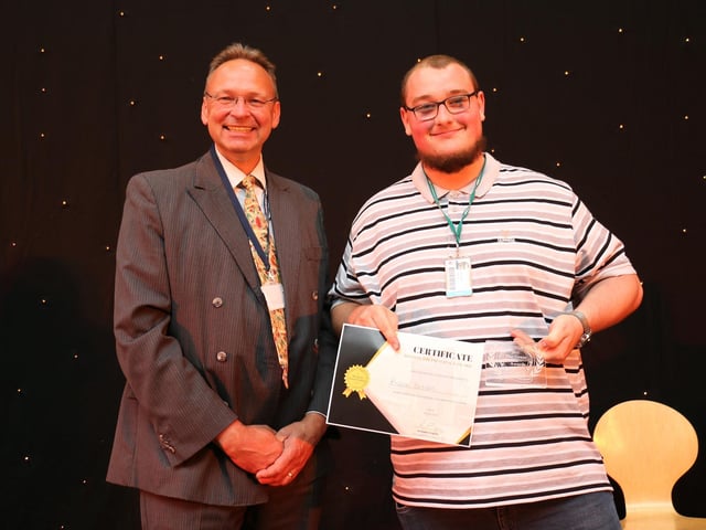 Andrew Cropley presented Branan Brown with his principal's award