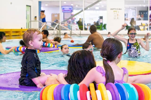 People enjoying the swimming pool at Go! active