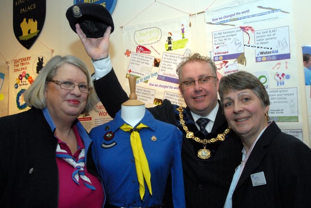 An exhibition was launched at Mansfield Museum in 2010 to celebrate 100 years of Girl guiding. From the left are Dee Miles, county commissioner, Mick Barton, then chairman of Mansfield Council and Judith Gill, divisional commissioner.