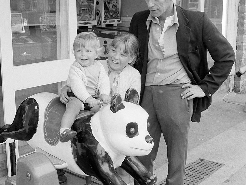 Do you recognise this family having fun on one of the rides?