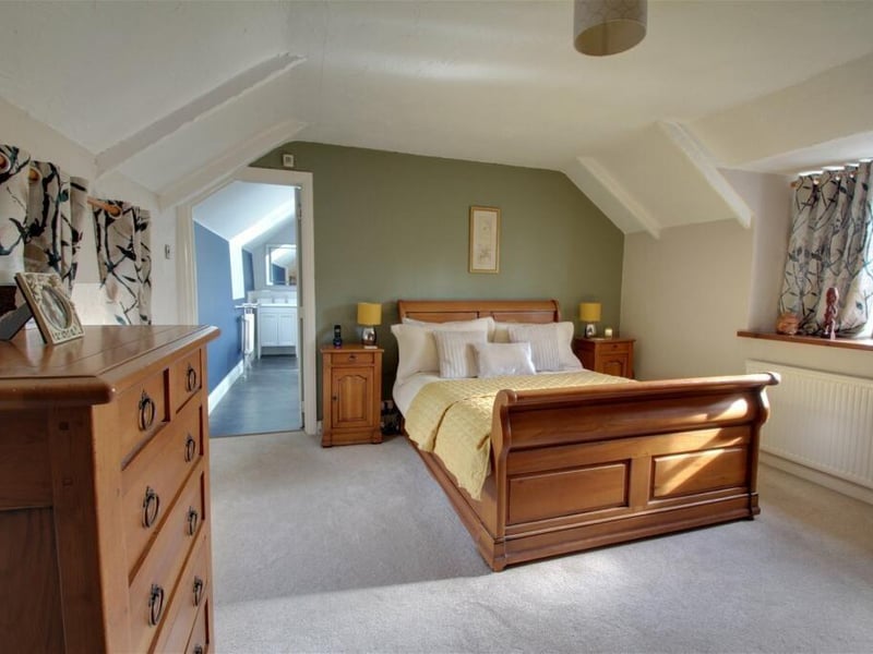 Moving up to the first floor at the Whitwell house, here is the principal bedroom, which is generously proportioned, with front and rear facing windows. There is ample space for free-standing furniture, plus access to an en suite bathroom.