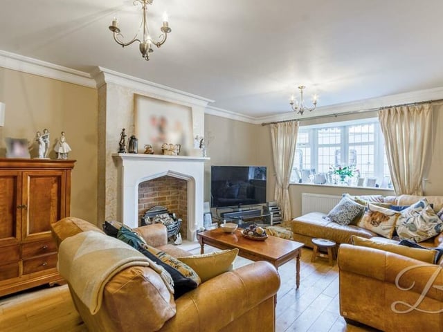Our tour of the £475,000 Stanton Hill house begins in the living room, the first of two reception rooms on the ground floor. An oak floor, feature fireplace and window facing the front all add character.