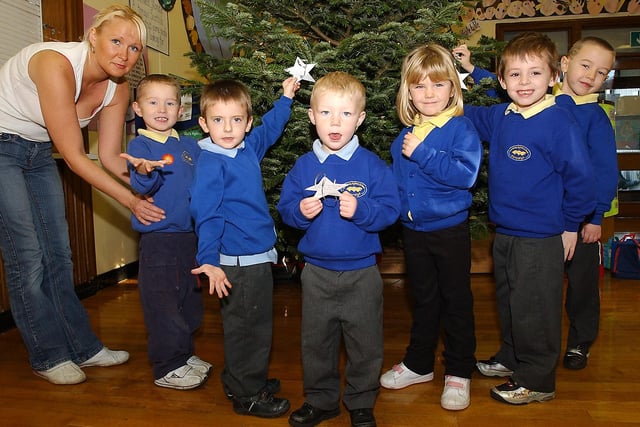 These Parkside Infants School pupils made their own stars and then decorated the school's Christmas tree with them in 2006.Can you spot someone you know in the photo?