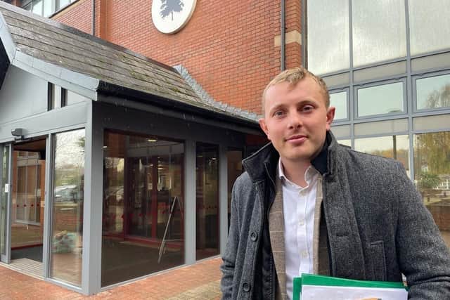 Coun Tom Hollis has been fined for owning dangerously out of control dogs