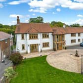 A guide price of £1 million has been attached to this incredible, oak-framed house, complete with indoor pool, sauna, games room, balcony and bar, on Mansfield Road, Skegby. It is for sale at auction with estate agents Open Door Property.