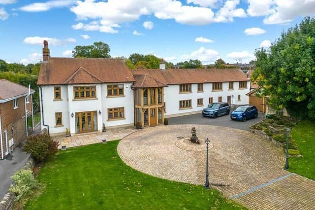 A guide price of £1 million has been attached to this incredible, oak-framed house, complete with indoor pool, sauna, games room, balcony and bar, on Mansfield Road, Skegby. It is for sale at auction with estate agents Open Door Property.