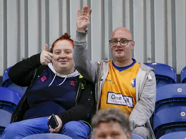 Mansfield Town fans watching the draw with Wrexham.